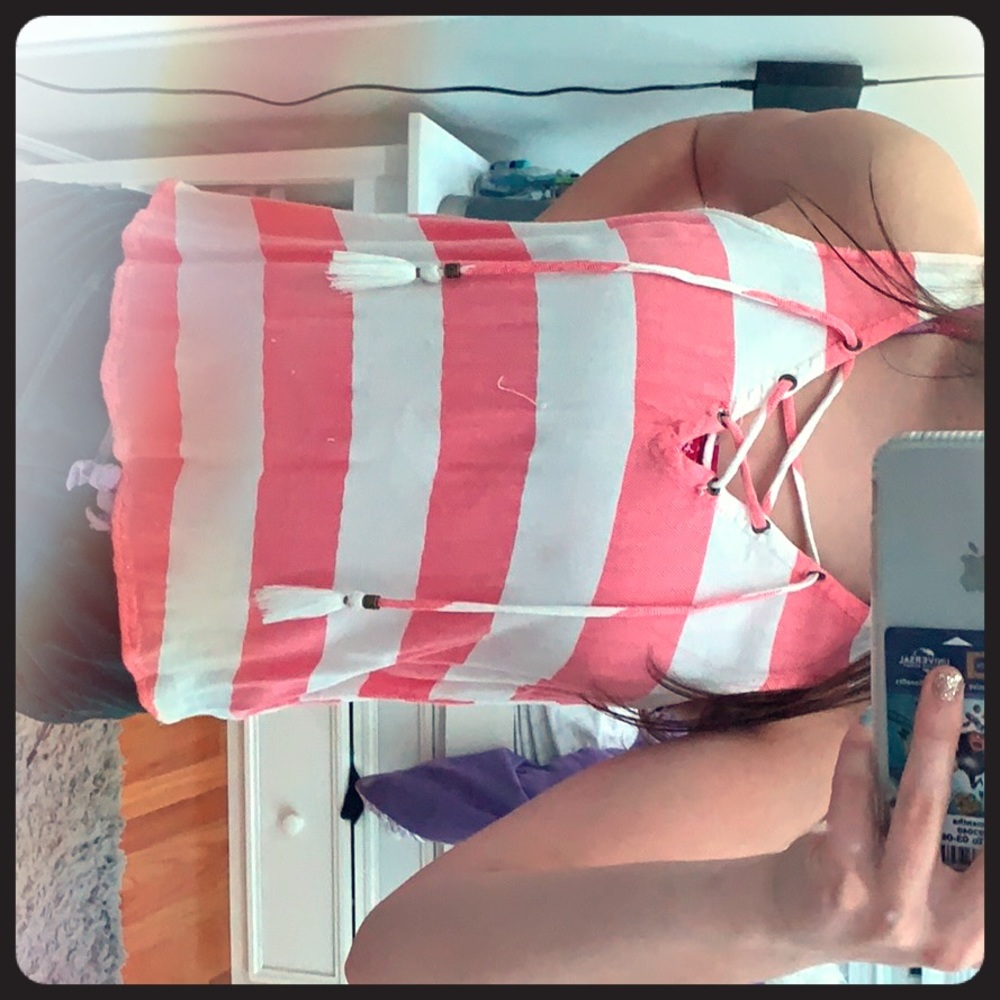 A Pink and white striped lace up tank top